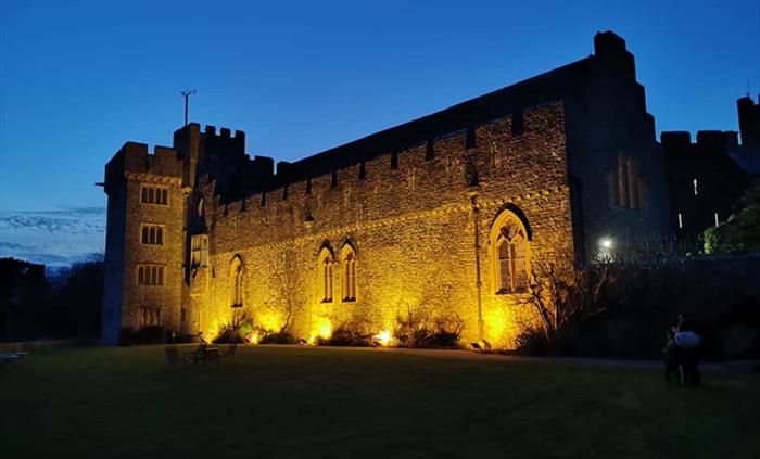 St Donat's Castle lit up in yellow